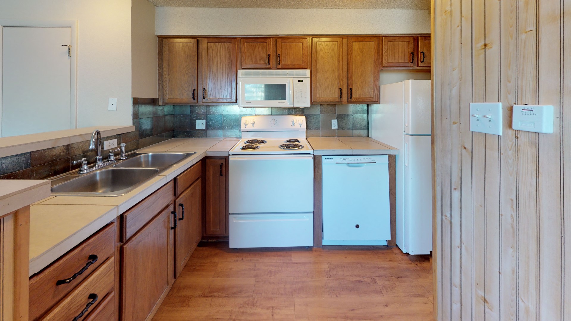 Plenty of cabinet space for storage in the kitchen